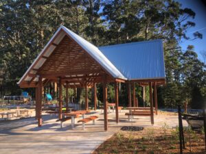 Design and construct, gable shelter, pedestrian bridge, all abilities restroom.